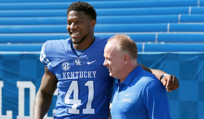 Allen and UK head coach Mark Stoops.